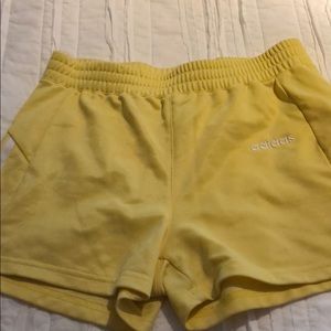 Yellow Adidas shorts with pocket in back